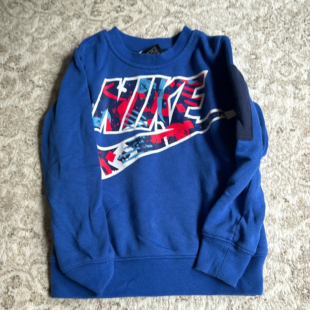 Nike size 4 shirt
